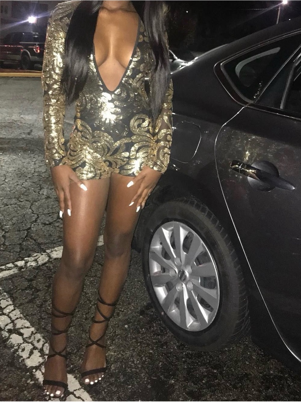 Plunge V-Neck Long Sleeve Sequin Romper in Gold and Black